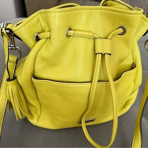 Coach Leather Convertible Bucket Bag with removable, adjustable strap and tassel